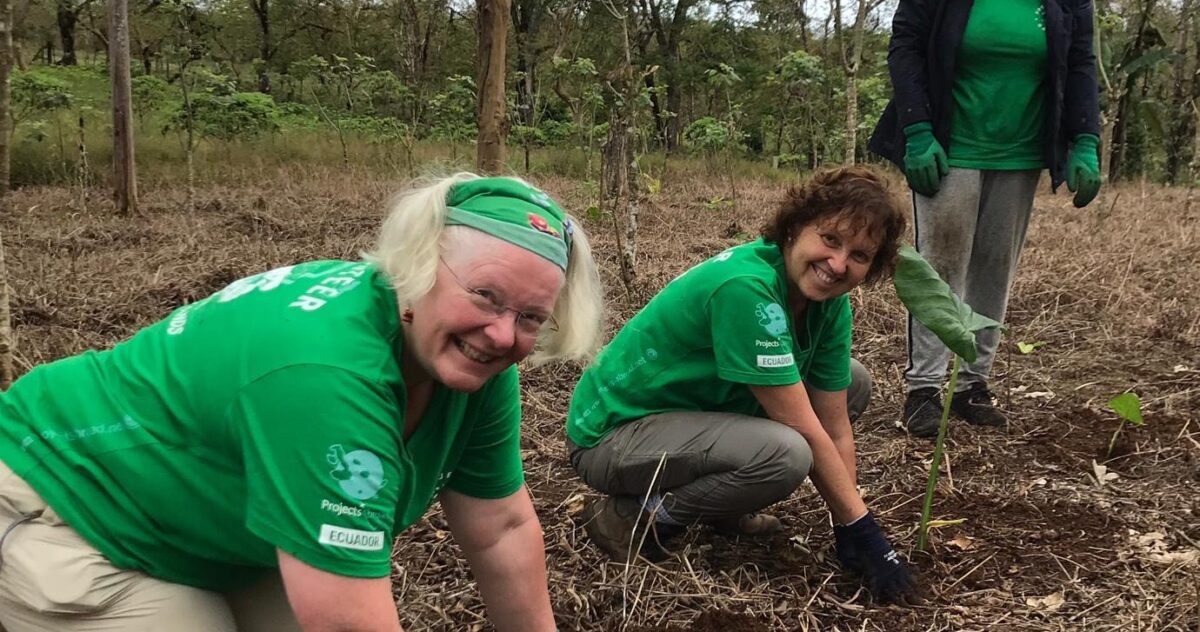 Older volunteers planting trees Project Abroad Over 50s program