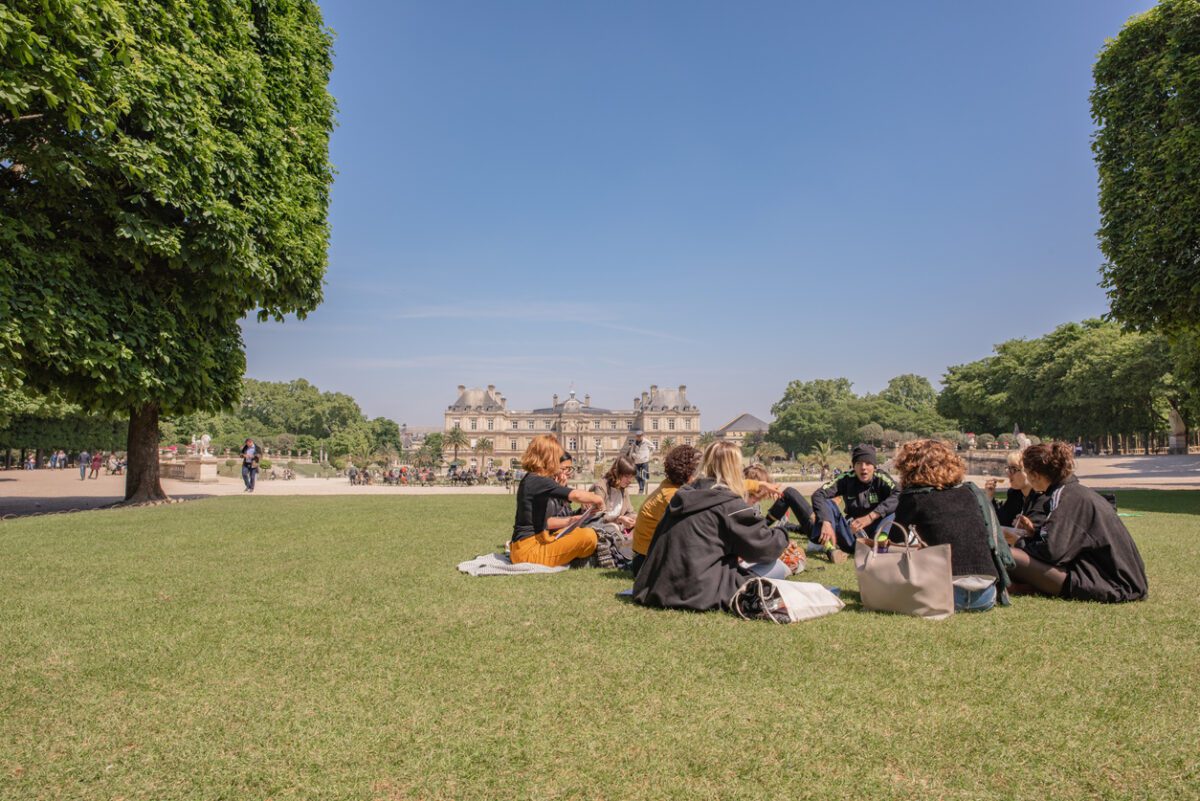College class meeting for lunch in the Luxembourg Gardens in Paris VolunteerForever